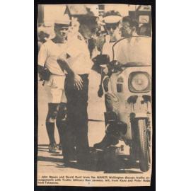 John Ngaau and David Hunt discuss traffic arrangements with Trafic Officers