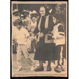 Image of Kuia being led by her mokopuna